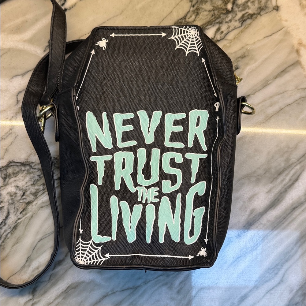 Beetlejuice Never Trust the Living crossbody bag